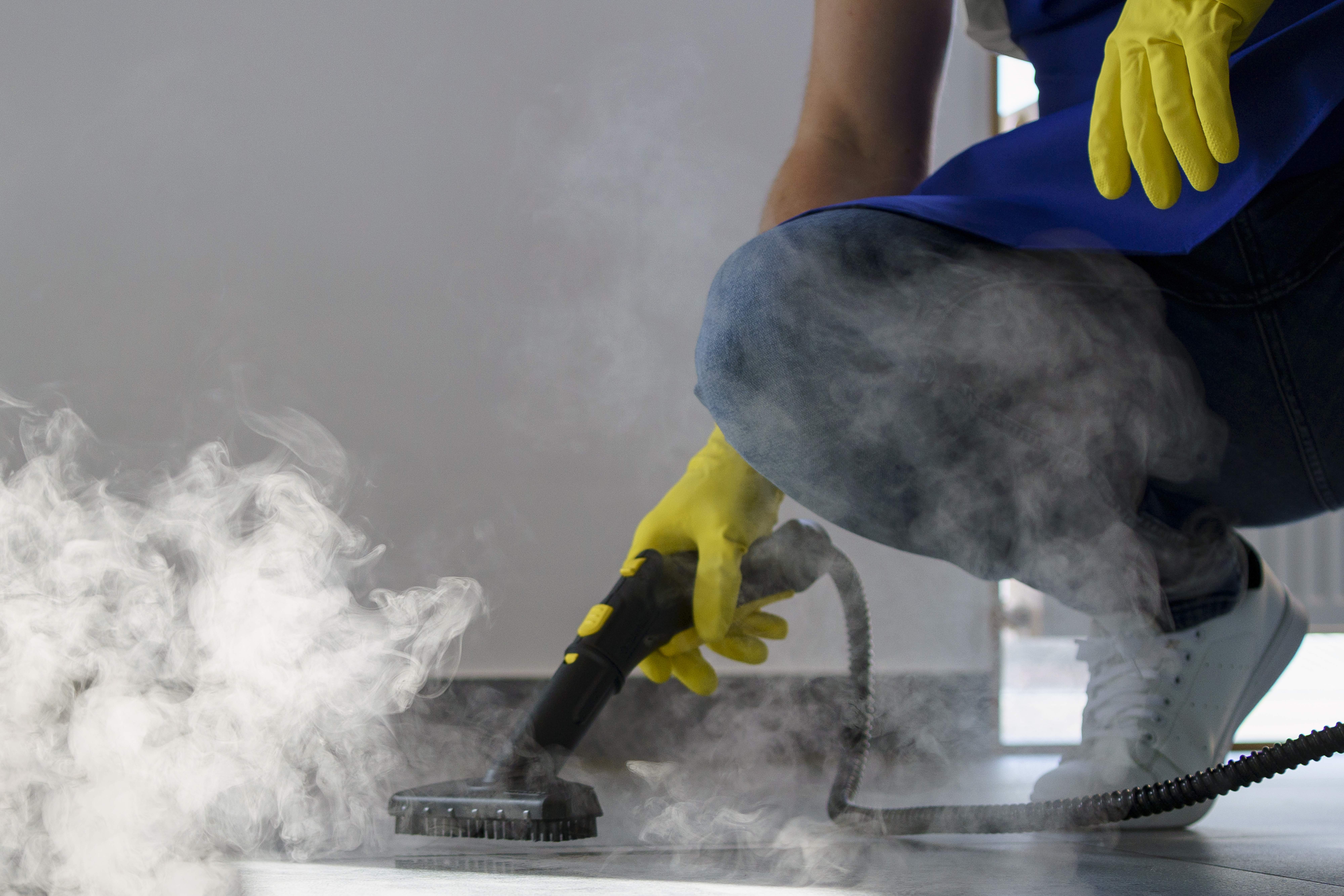professional-cleaning-service-person-using-steam-cleaner-office (1) professional-cleaning-service-person-using-steam-cleaner-office (1)